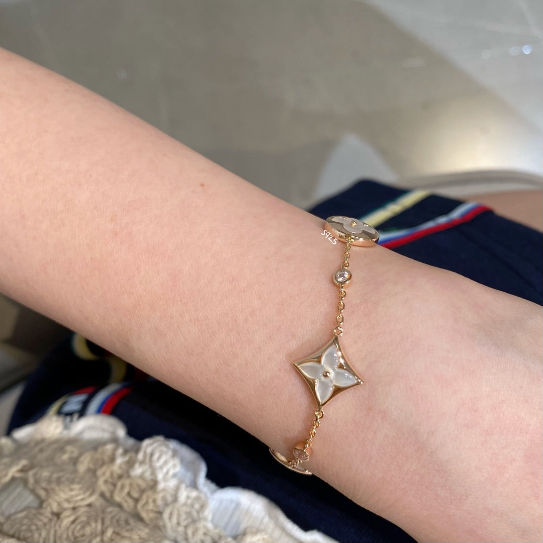 [Marin]STAR AND SUN 4 MOTIF WHITE MOP PINK GOLD BRACELET