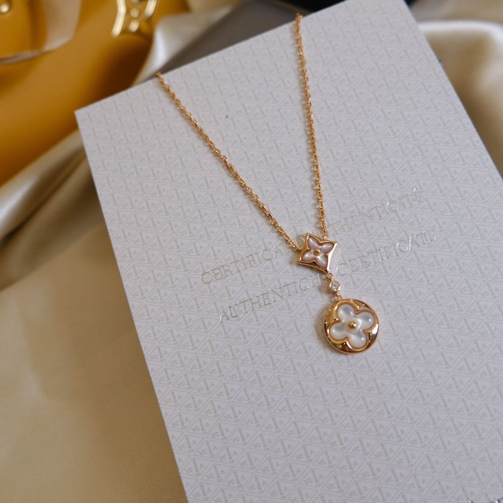[Marin]COLLIER ÉTOILE ET SOLEIL EN NACRE BLANCHE À 2 MOTIFS EN OR ROSE