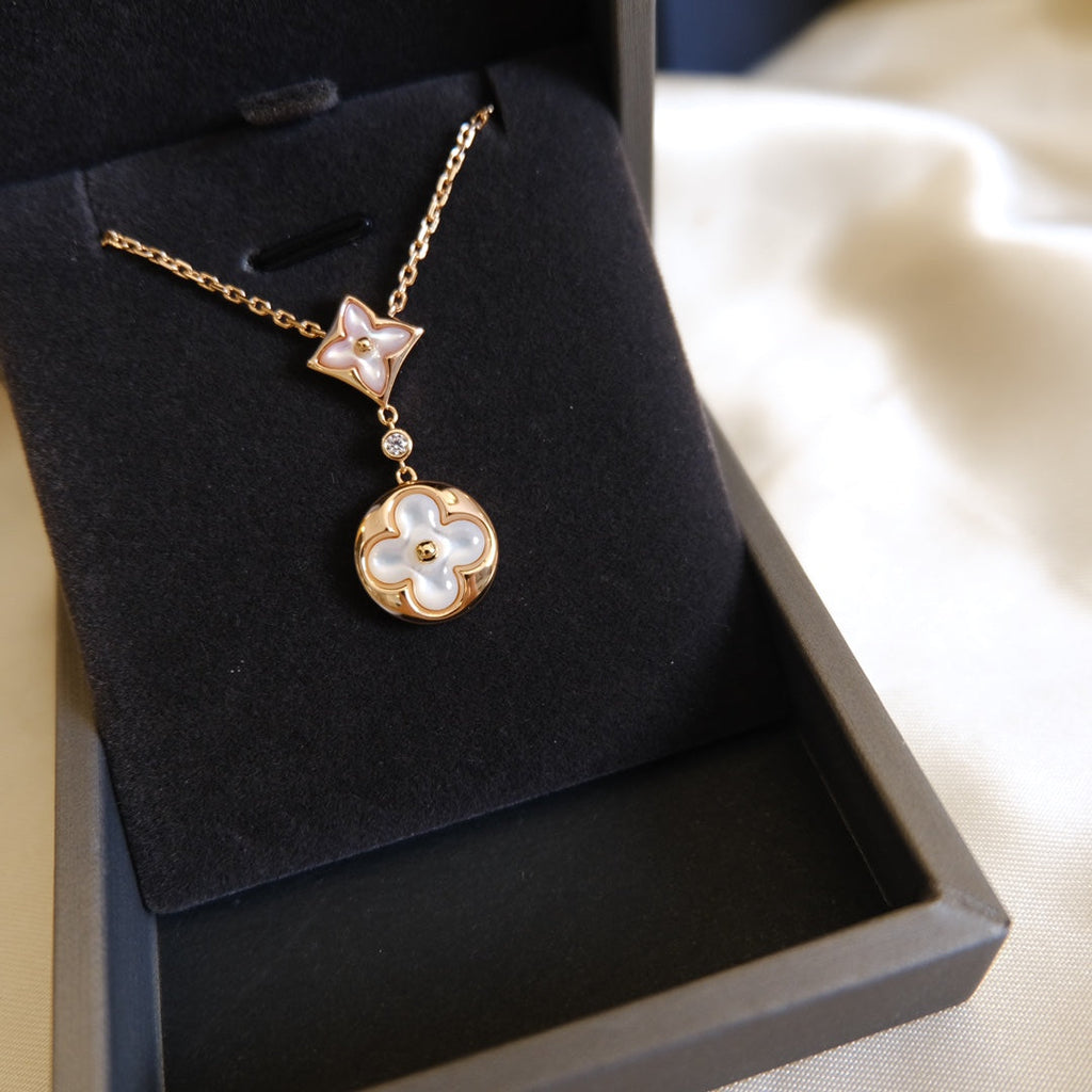 [Marin]COLLIER ÉTOILE ET SOLEIL EN NACRE BLANCHE À 2 MOTIFS EN OR ROSE