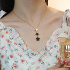 [Marin]STAR AND SUN ONYX PINK GOLD NECKLACE
